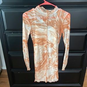 Long sleeve tie dye dress. Sheer, comes with slip under